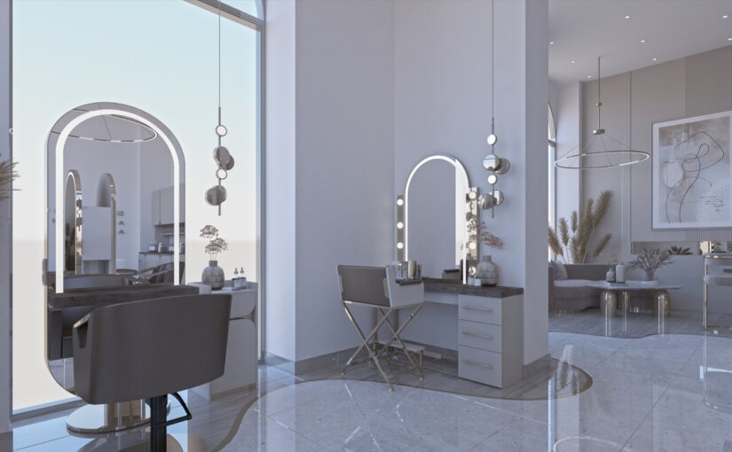 Stylingbereich der Celebrity Hairlounge Wien mit beleuchteten Spiegeln und modernen Friseurplätzen