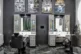 Barber Arbeitsplätze mit Spiegeln und stilvoller Saloneinrichtung im El Loco Barbershop Wien