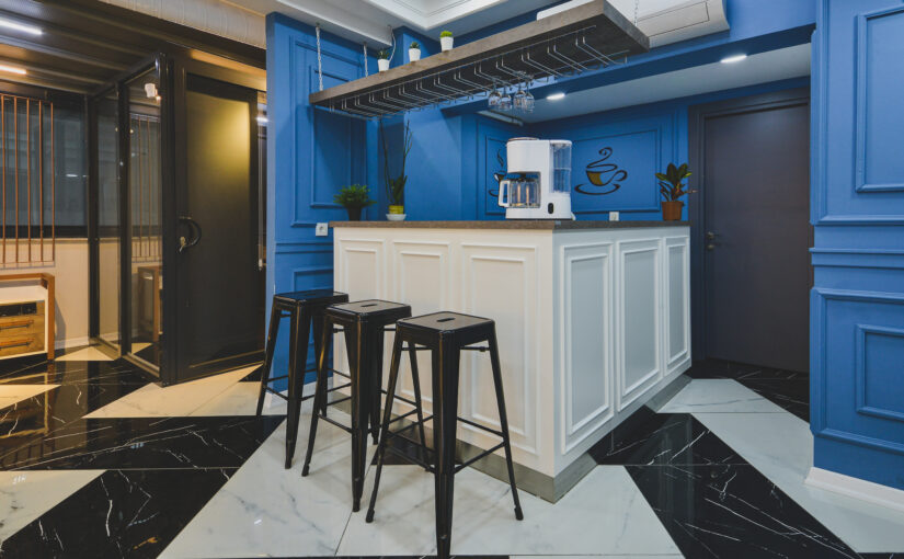Kundenlounge mit Kaffeebar in modernem Premium Friseursalon